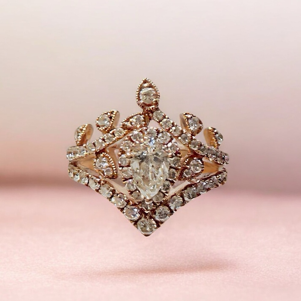 • 14 Karat Rose Gold Diamond Ring •